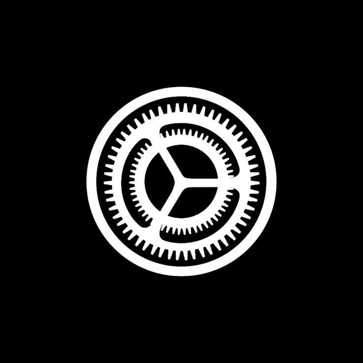 White gear icon on a black background, resembling settings or mechanical parts.