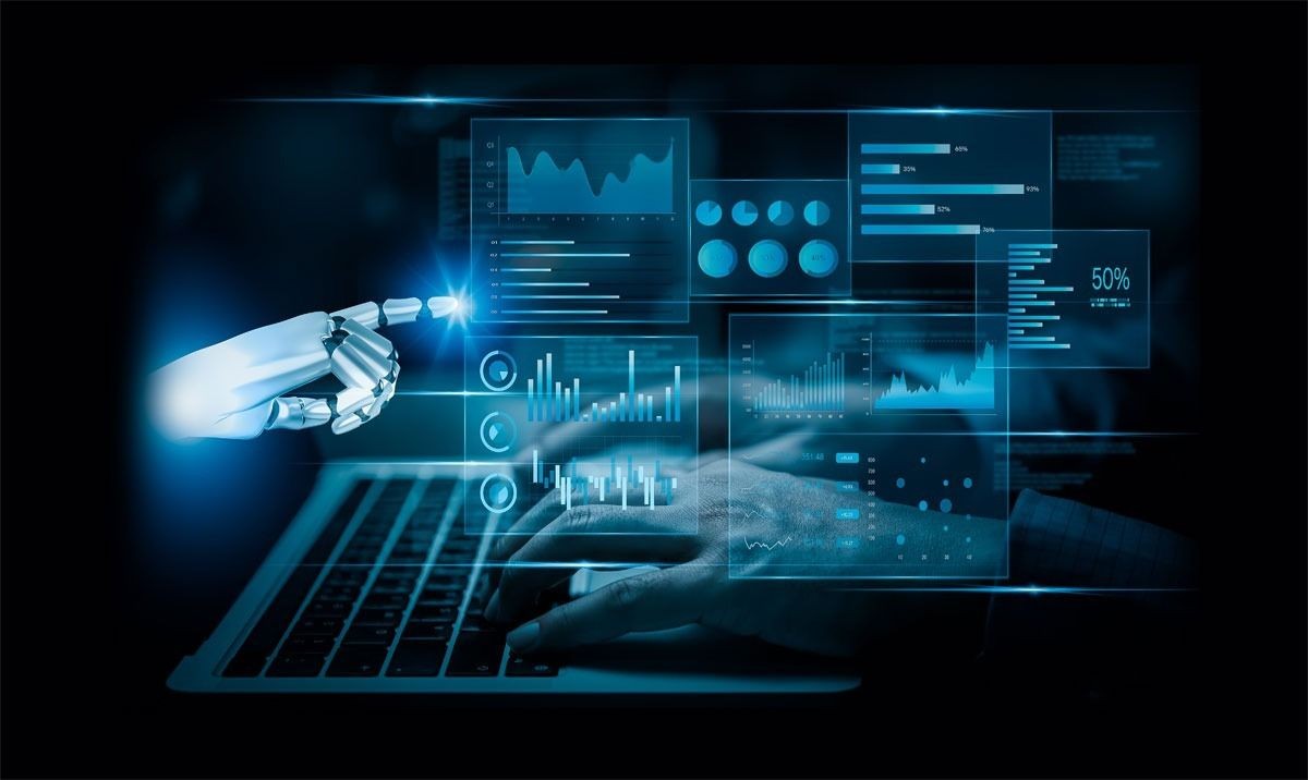 Robot hand interacting with virtual analytics graphs over a laptop keyboard, symbolizing AI in data analysis.